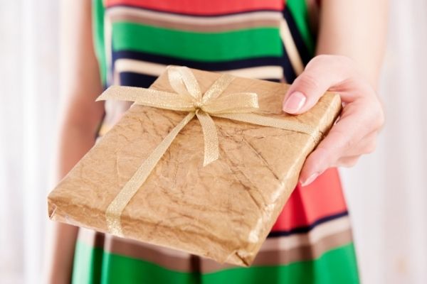 woman holding Xmas gift