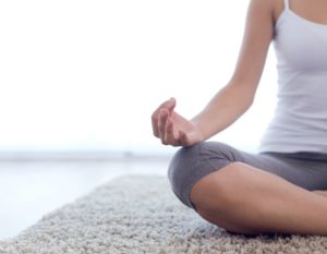 woman meditating: best meditation books 2022