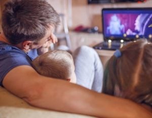 traditions for families examples you'll love: dad with arms around kids