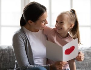 mom and daughter doing fun gratitude activities for kids & games too