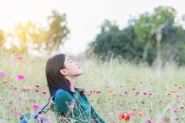 teenager breathing in nature