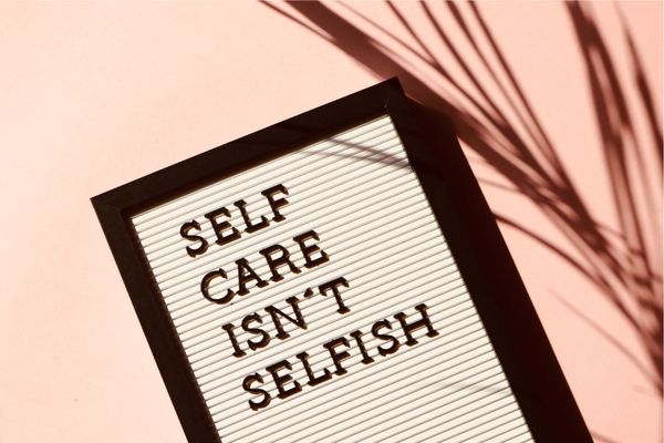 self care isn't selfish sign