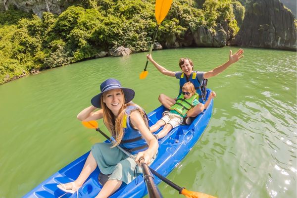 kids and mom in a kayake