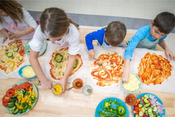 making pizza; family staycation ideas for kids