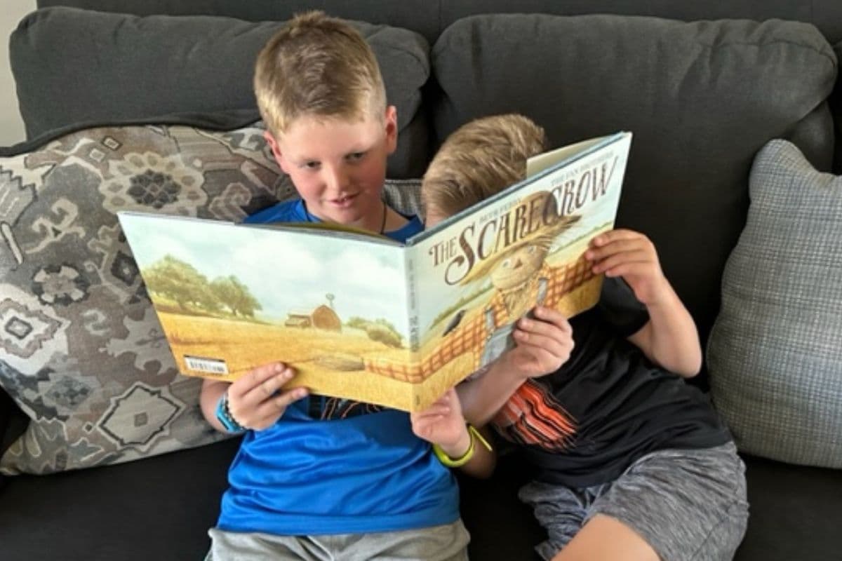 boys reading on couch; picture books for fall; autumn books to read