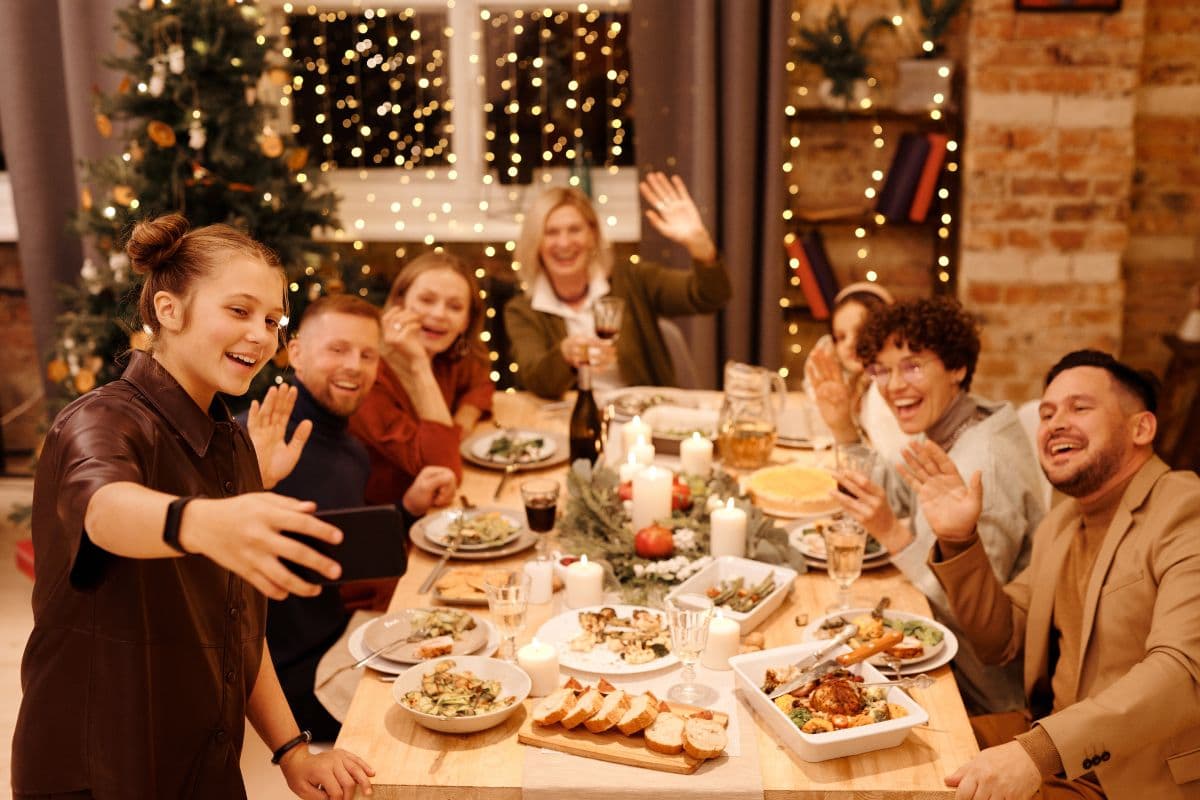 family gathered around a table for Christmas dinner