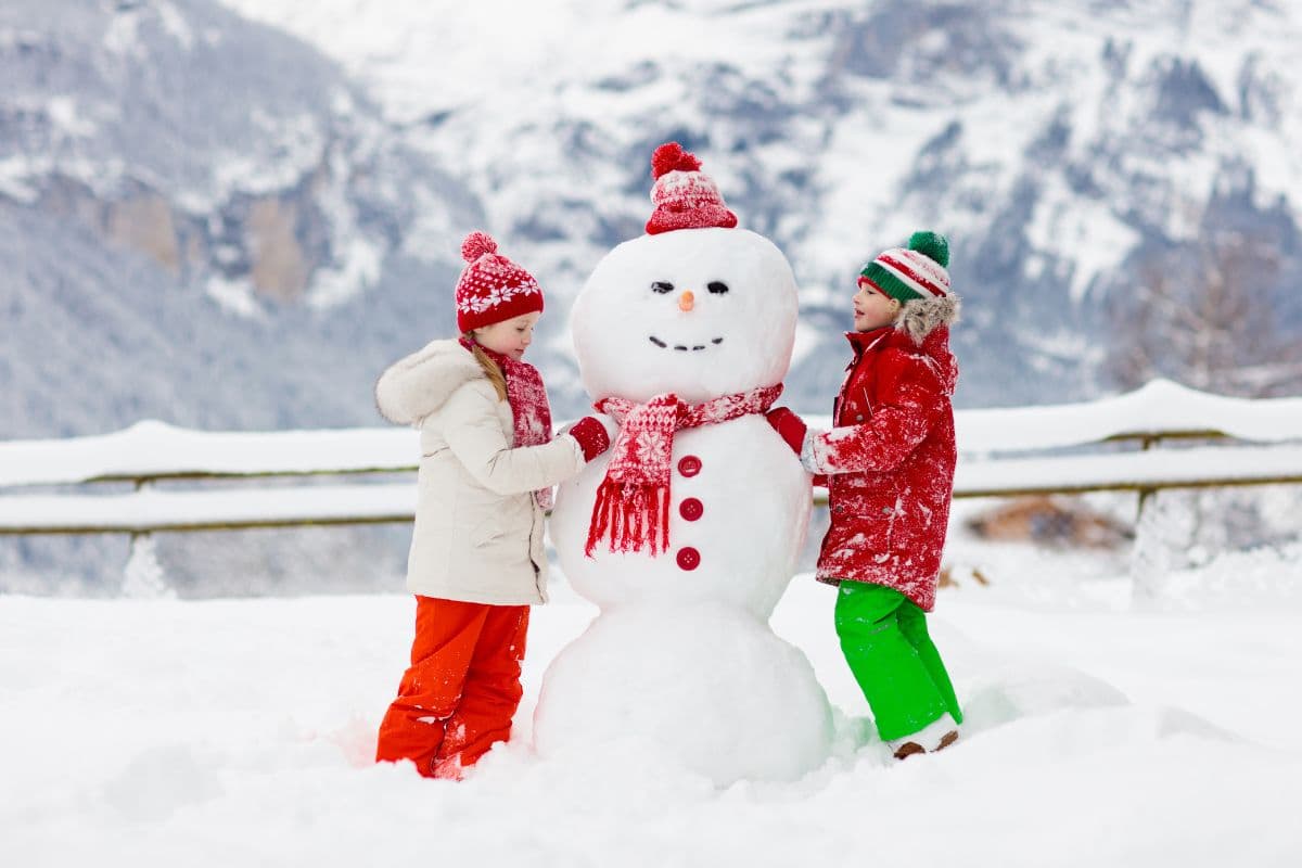kids building a snowman