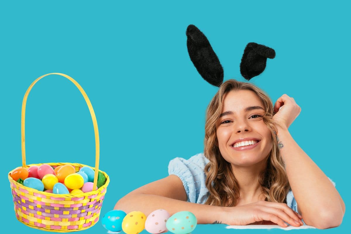 woman wearing Easter bunny ears with eggs and basket