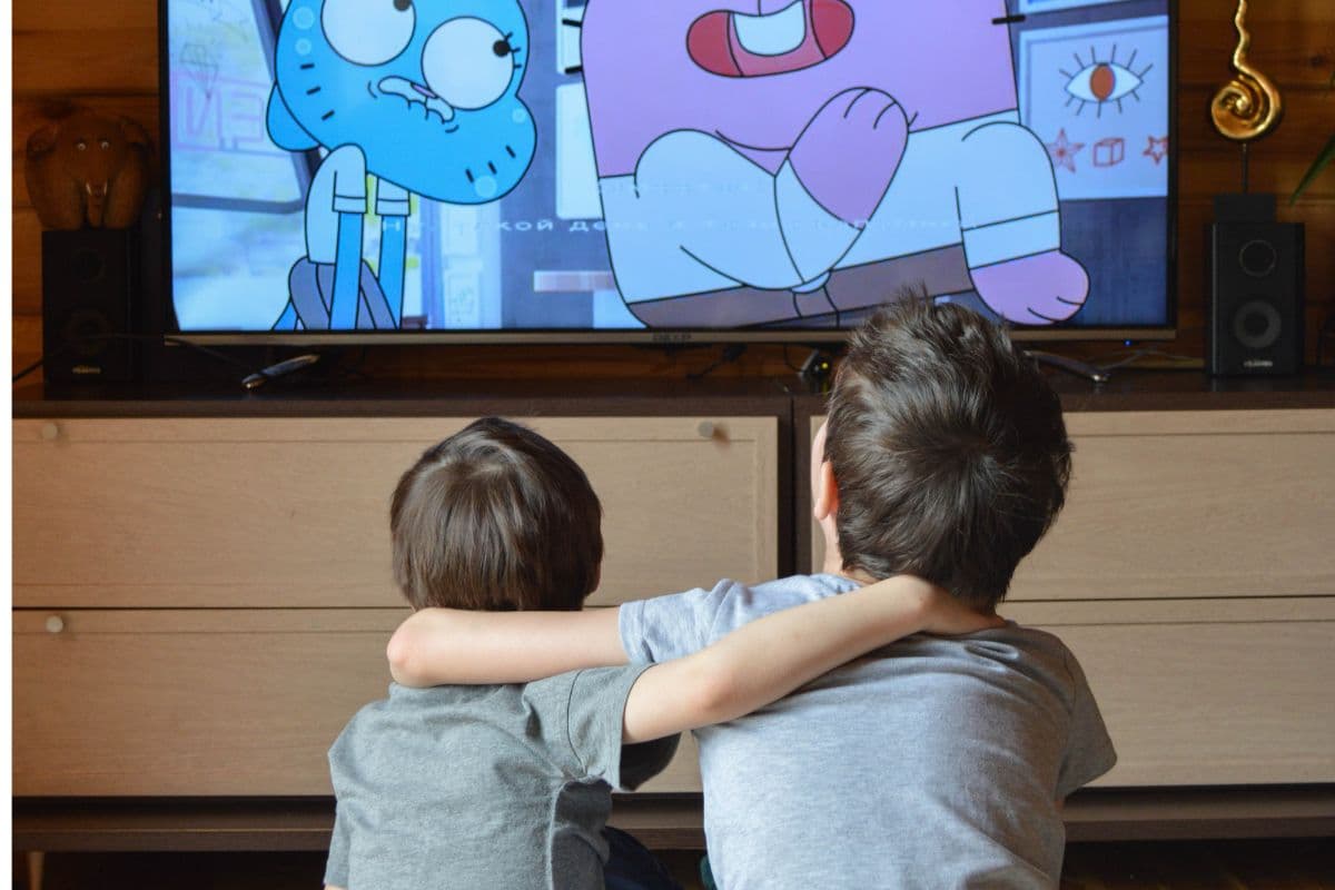 two boys watching cartoons
