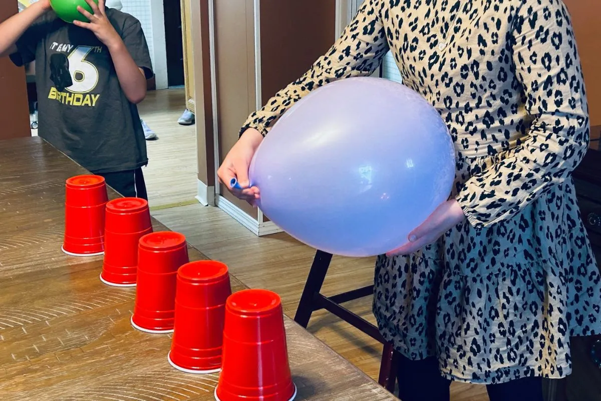 fun balloon minute to win it games for teens; challenges