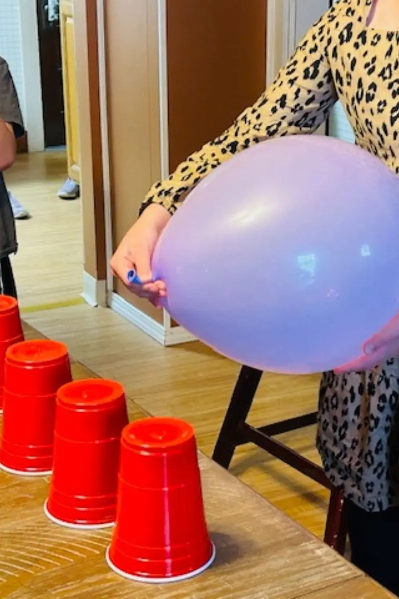 fun balloon minute to win it games for teens; challenges