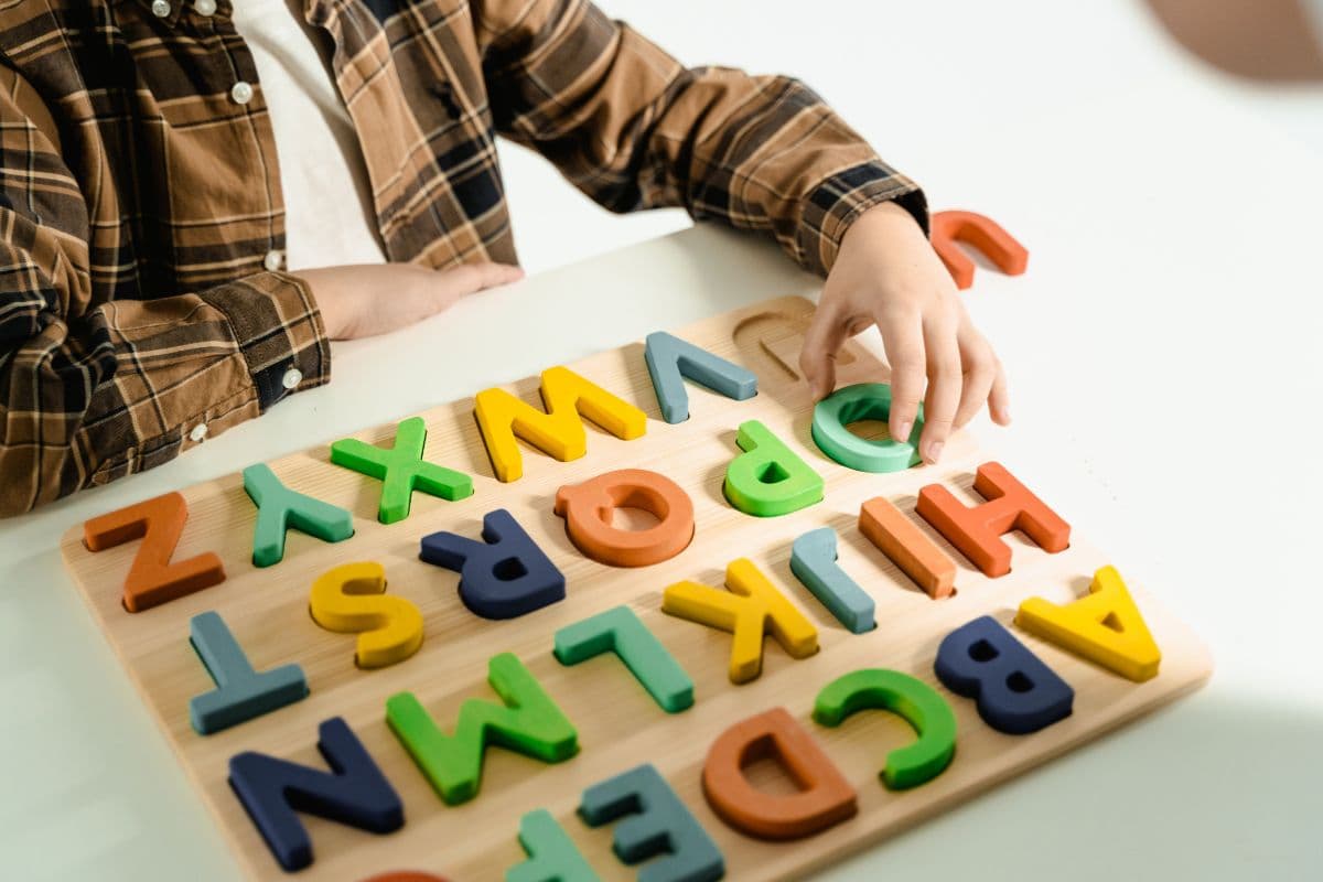 child doing a puzzle