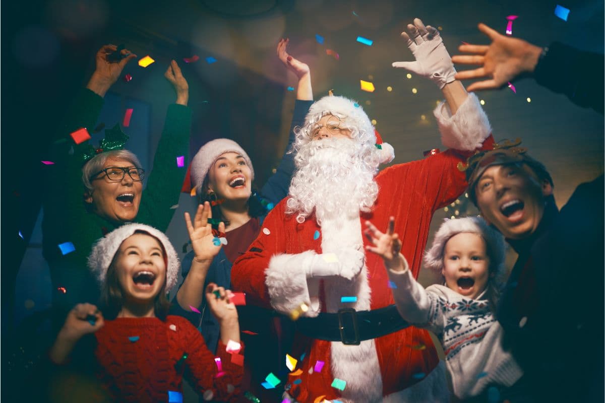 Santa dancing with family