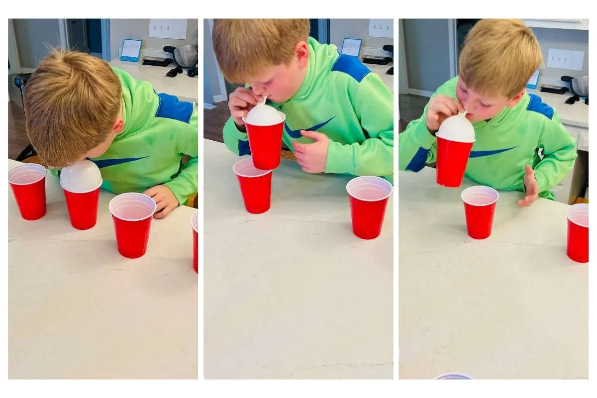 new years eve games; cup stack with a balloon