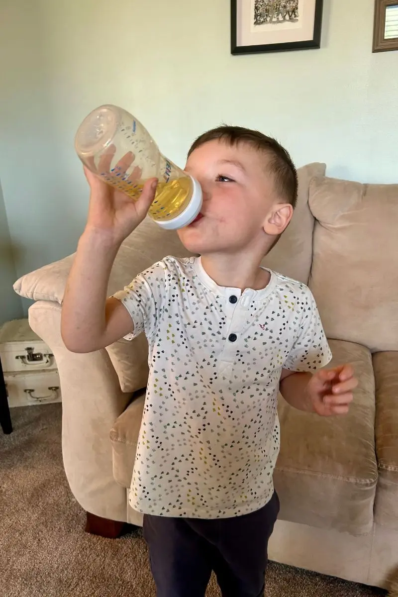 bottle chug minute to win it games for baby shower, coed