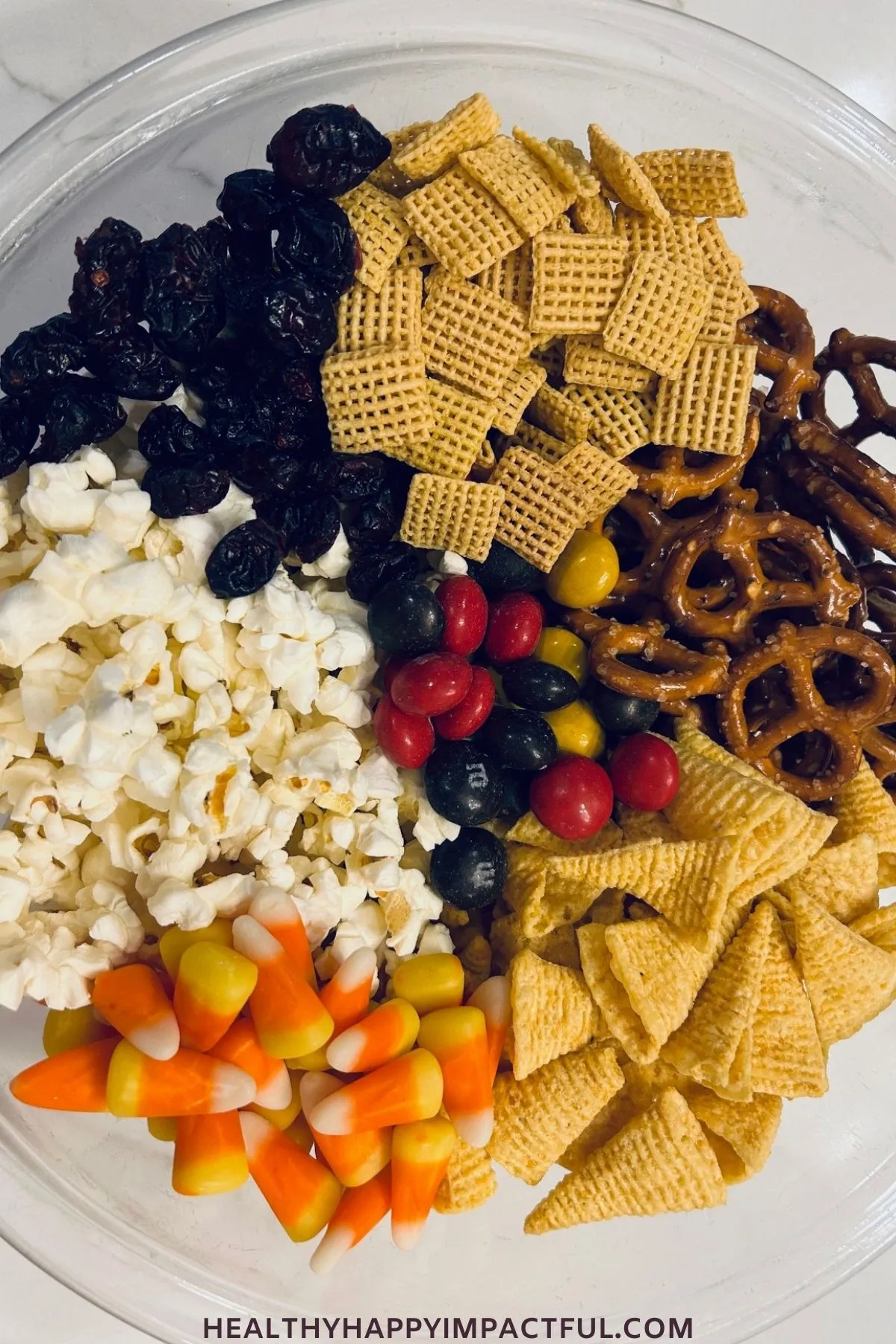 popcorn, candy corn, chocolate, bugles, pretzels, chex