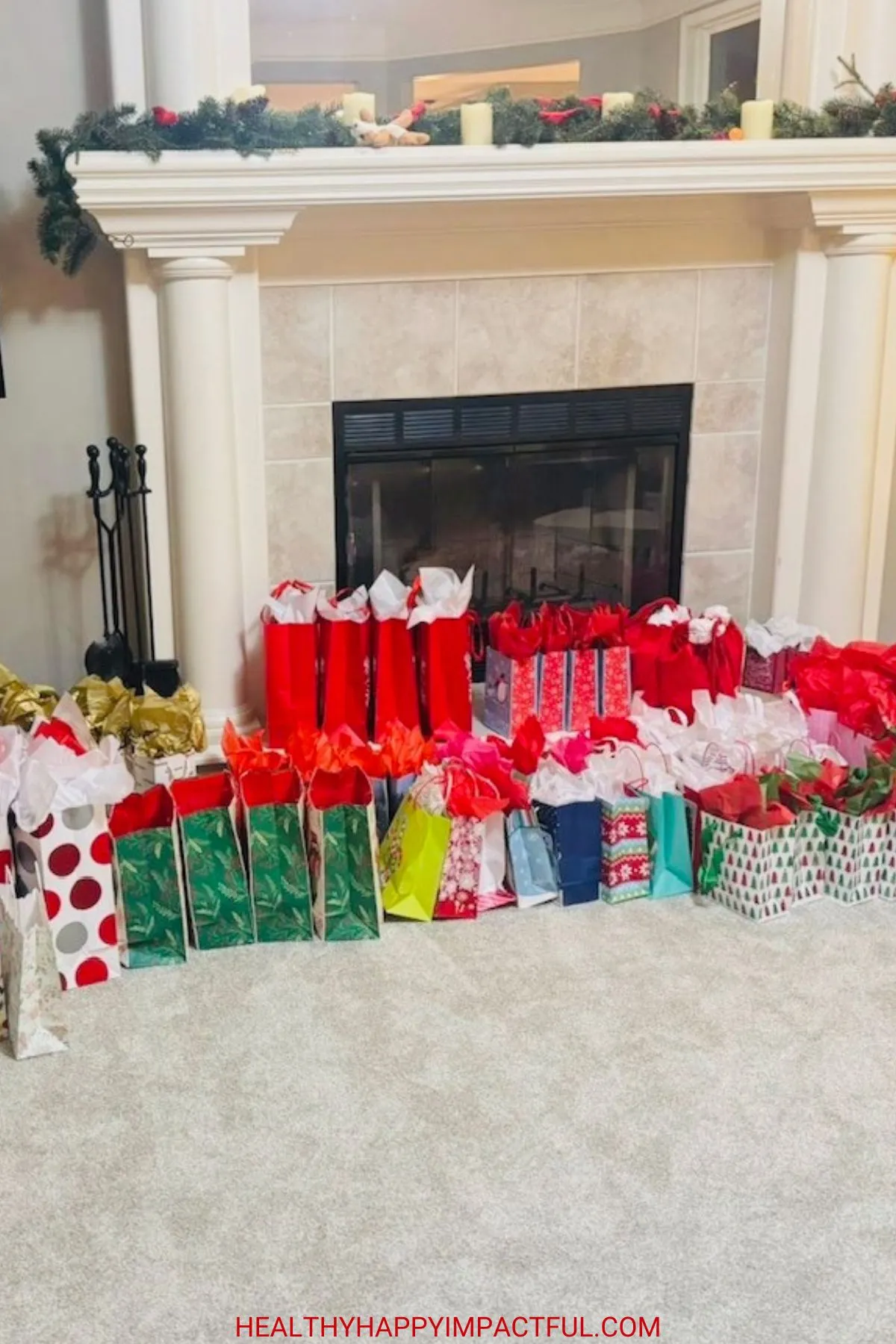 Christmas gifts in front of a fireplace mantle