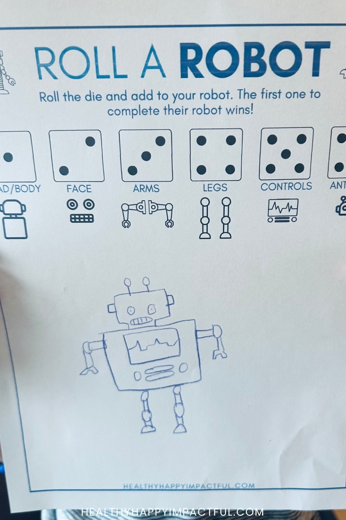 boy holding drawing