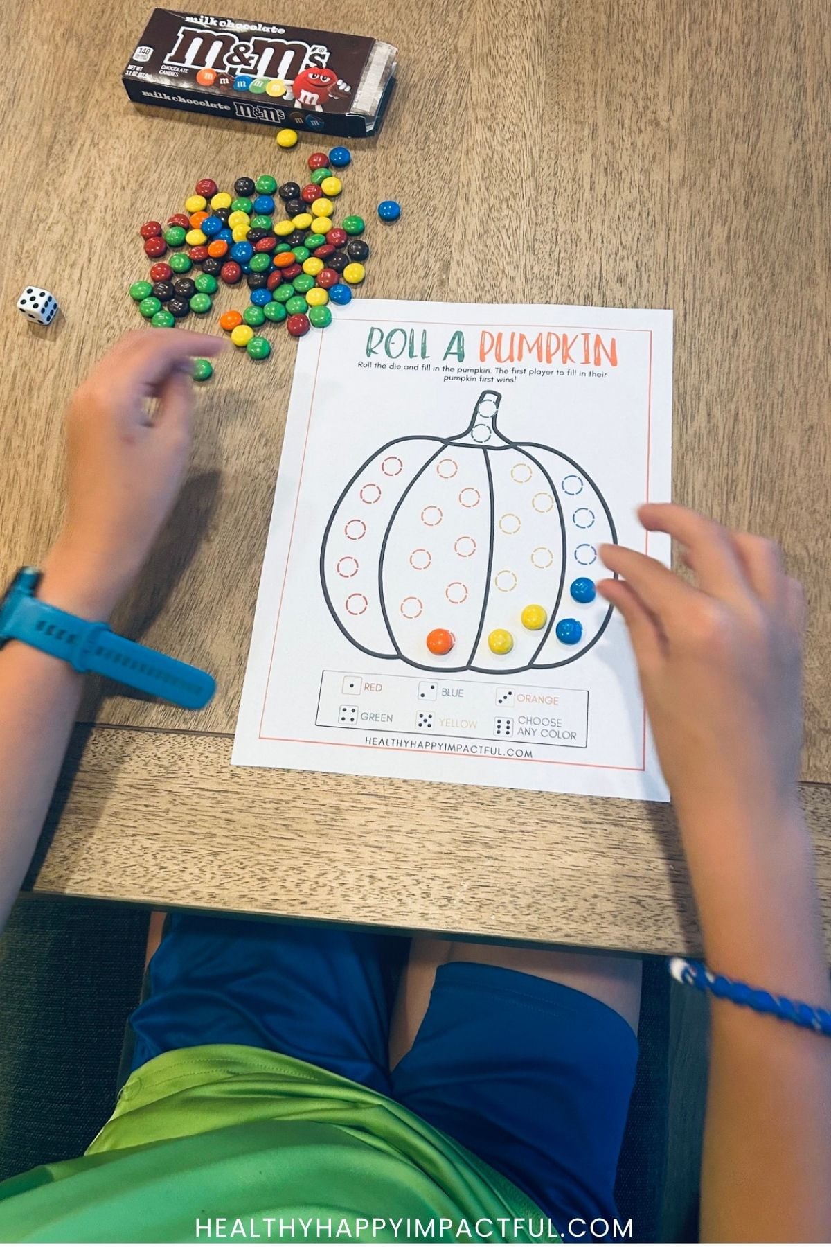 boy playing a fall and Halloween game