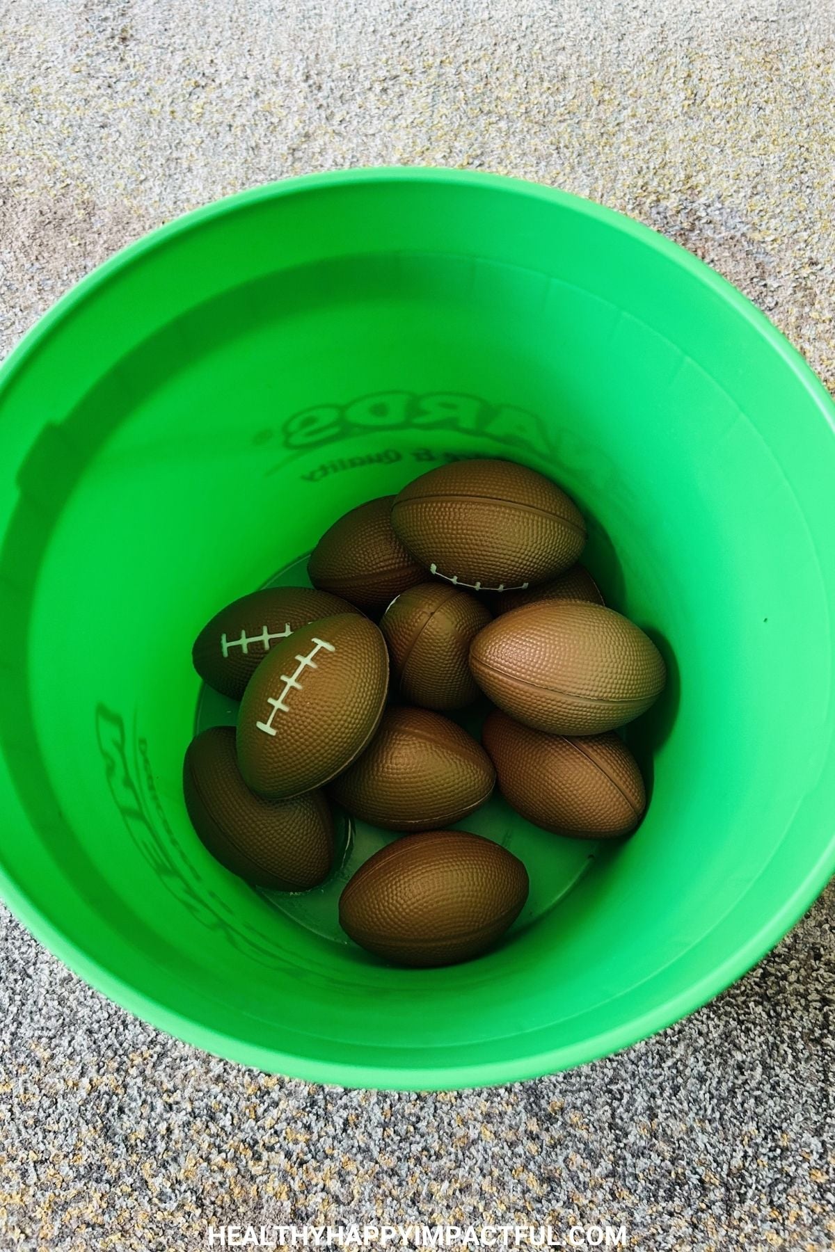 bucket of footballs