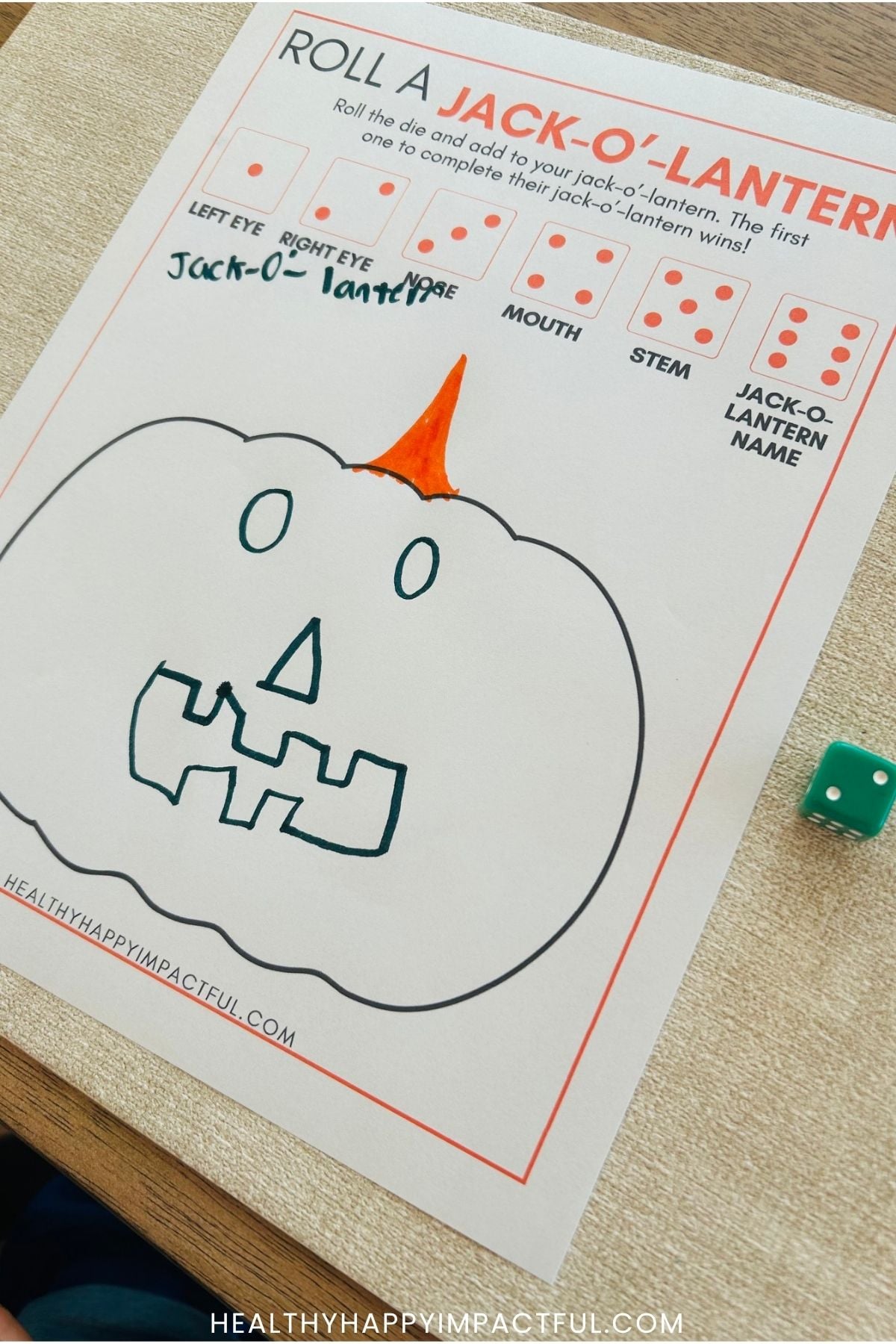 roll a jack-o-lantern game