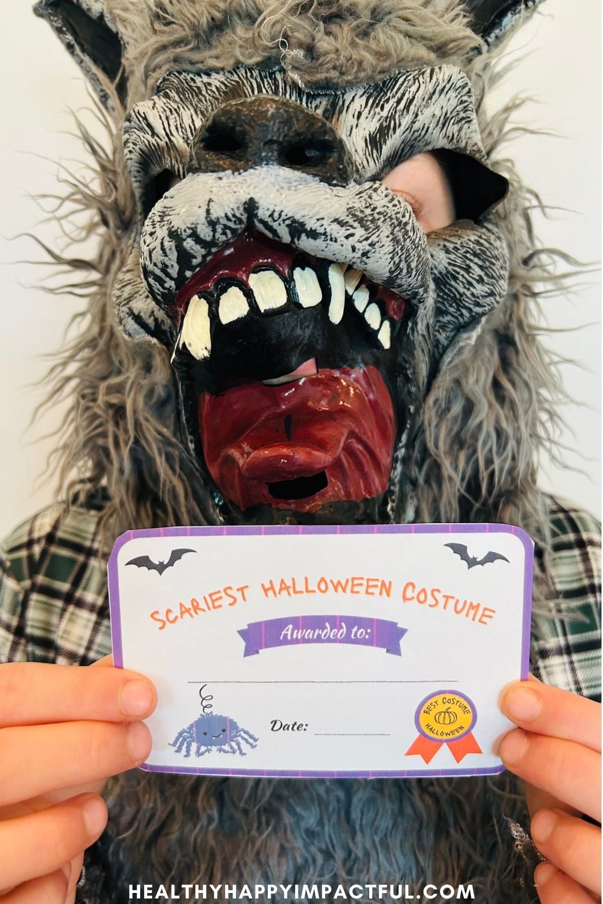 boy in a werewolf mask
