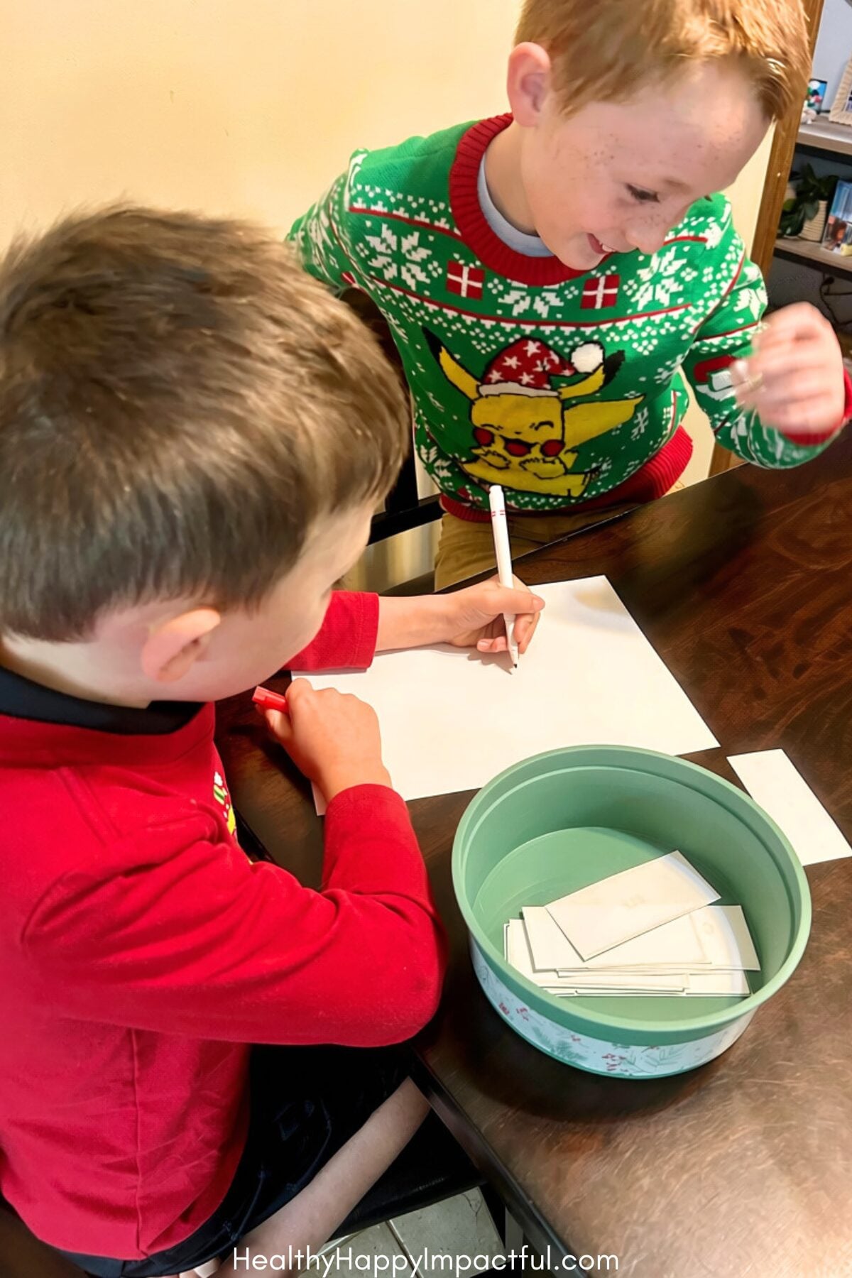 Kids playing Christmas Sketch & Draw Holiday Game