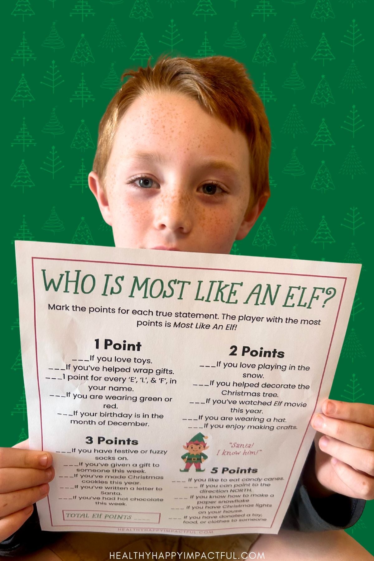 boy holding christmas game